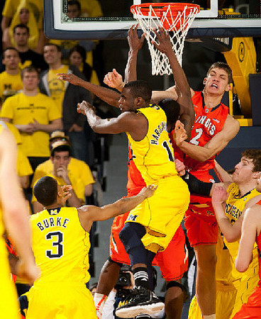 Trey Burke (3), Tim Hardaway Jr. (10), and Evan Smotrycz (23)