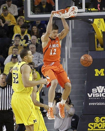 Jordan Morgan (52) and Trey Burke (3)
