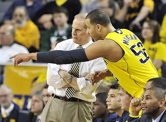 Jordan Morgan (52) and John Beilein