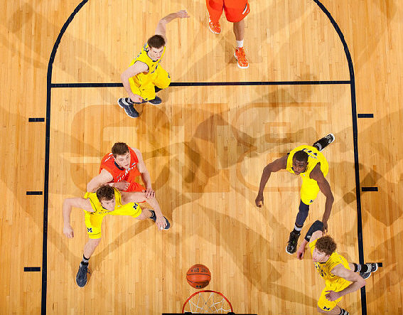 Zack Novak (0), Stu Douglass (1), Tim Hardaway Jr. (10), and Evan Smotrycz (23)