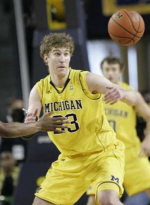 Evan Smotrycz (23) and Zack Novak (0)