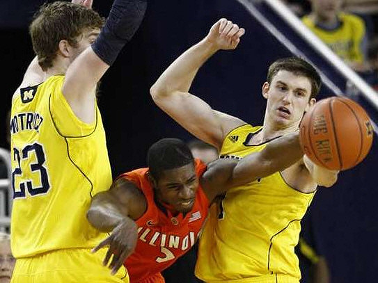Evan Smotrycz (23) and Stu Douglass (1)