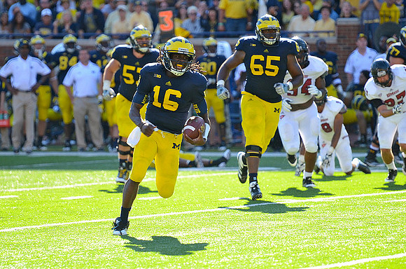 Elliott Mealer (57), Denard Robinson (16), and Patrick Omameh (65)