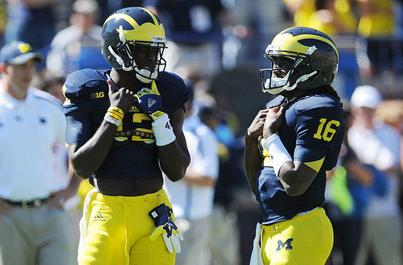 Devin Gardner (12) and Denard Robinson (16)