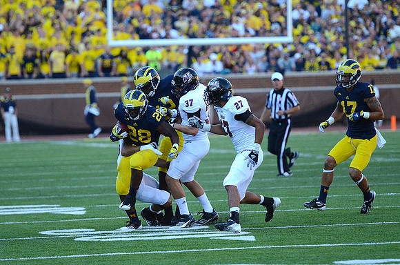 Fitzgerald Toussaint (28), Ricky Barnum (52), and Jeremy Jackson (17)