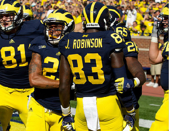Mike Kwiatkowski (81), Roy Roundtree (21), Jerald Robinson (83), Patrick Omameh (65), and Fitzgerald Toussaint (28)