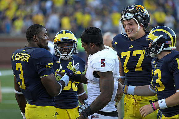 Marvin Robinson (3), Thomas Rawls (38), Taylor Lewan (77), and Alex Swieca (13)