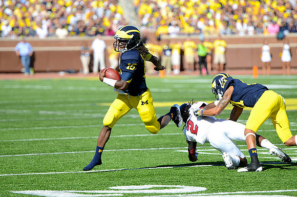 Denard Robinson (16) and Roy Roundtree (21)