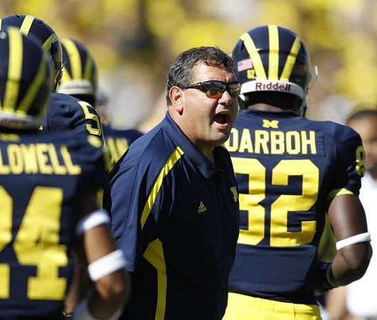 Delonte Hollowell (24), Brady Hoke, and Amara Darboh (82)