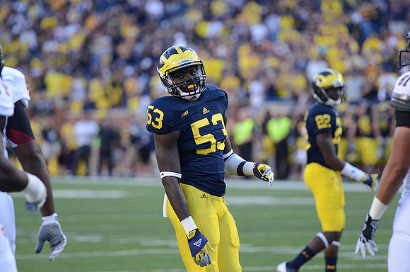 Mario Ojemudia (53) and Jarrod Wilson (22)