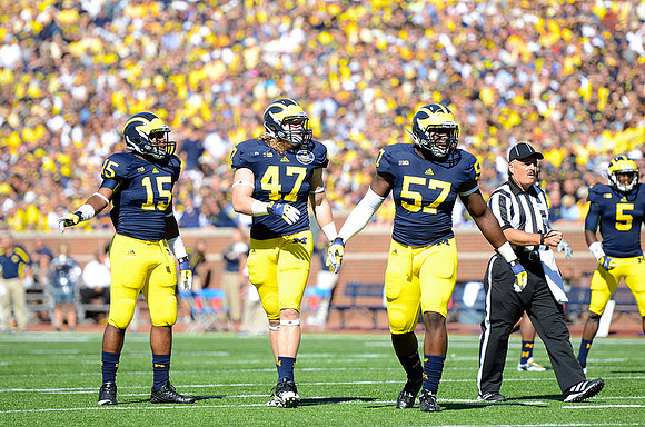 James Ross (15), Jake Ryan (47), Frank Clark (57), and Courtney Avery (5)