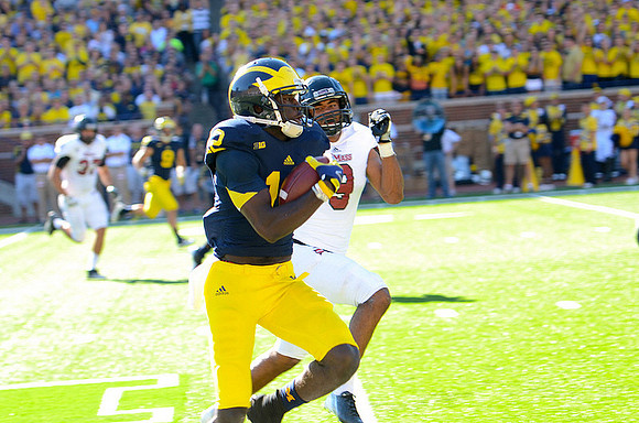 Drew Dileo (9) and Devin Gardner (12)