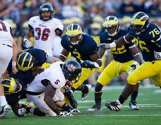 Marvin Robinson (3), Jarrod Wilson (22), and Quinton Washington (76)