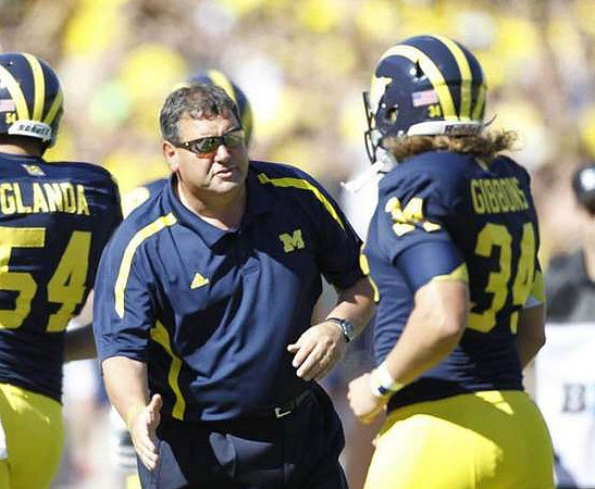Jareth Glanda (54), Brady Hoke, and Brendan Gibbons (34)