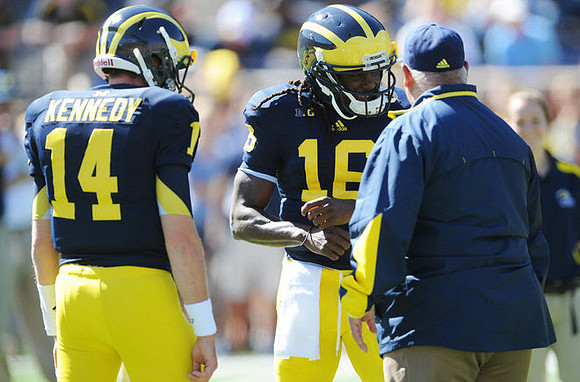 Jack Kennedy (14) and Denard Robinson (16)