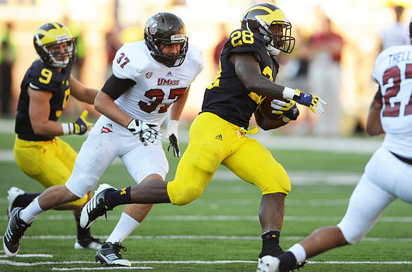 Drew Dileo (9) and Fitzgerald Toussaint (28)