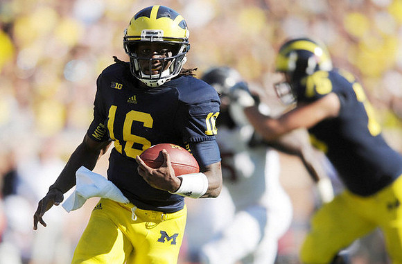 Denard Robinson (16) and Michael Schofield (75)
