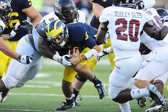 Joey Burzynski (56) and Russell Bellomy (8)