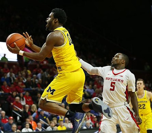 Derrick Walton Jr. (10) and Duncan Robinson (22)
