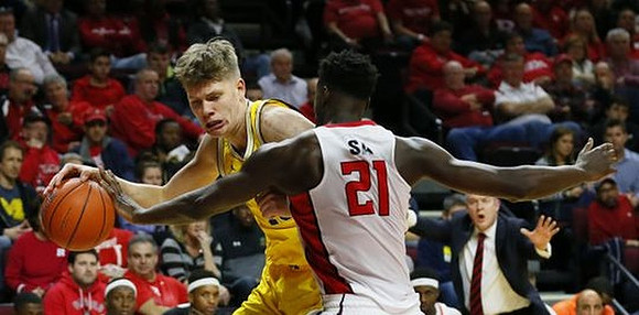 Moritz Wagner (13) and Rutgers Head Coach Steve Pikiell