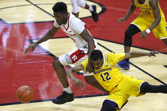 Muhammad-Ali Abdur-Rahkman (12) and Derrick Walton Jr. (10)