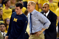 Andrew Dakich (11) , John Beilein, and Saddi Washington