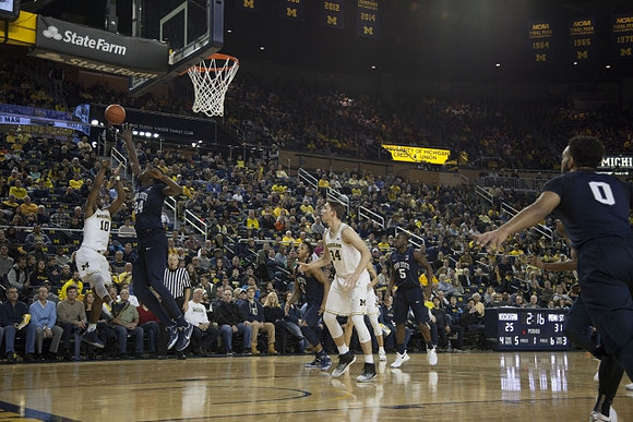 Derrick Walton Jr. (10) and Mark Donnal (34)