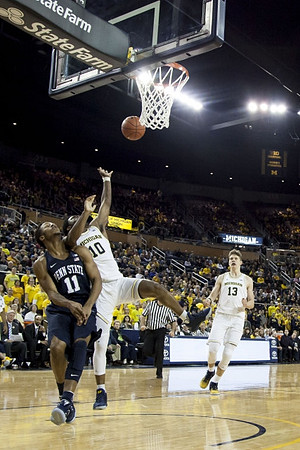 Derrick Walton Jr. (10) and Moritz Wagner (13)
