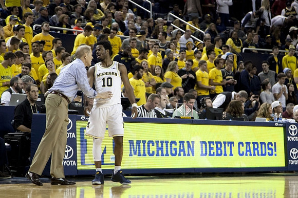 John Beilein and Derrick Walton Jr. (10)