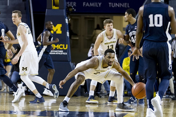 Duncan Robinson (22), Moritz Wagner (13), and Zak Irvin (21)