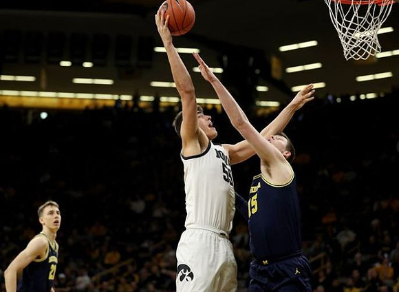 David DeJulius (0) and Jon Teske (15)