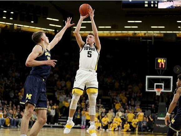 Franz Wagner (21) and Eli Brooks (55)