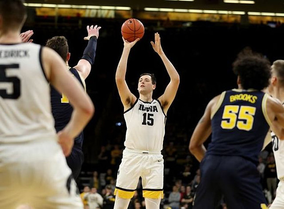 Jon Teske (15) and Eli Brooks (55)