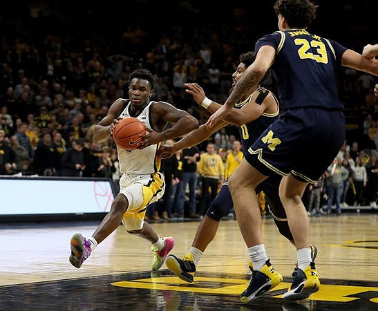 Brandon Johns Jr. (23) and David DeJulius (0)
