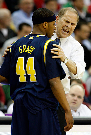 Kelvin Grady (44) and John Beilein