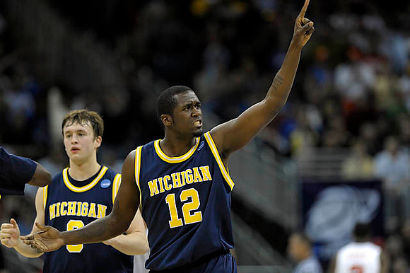 Anthony Wright (12) and Zack Novak (0)