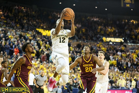 Muhammad-Ali Abdur-Rahkman (12) and Moritz Wagner (13)