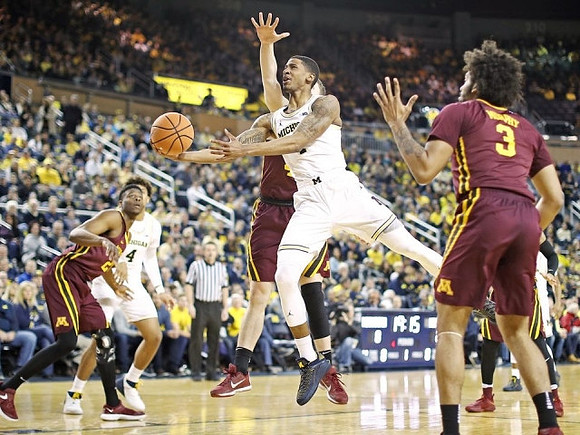 Isaiah Livers (4) and Charles Matthews (1)
