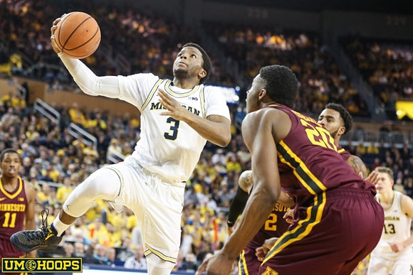 Zavier Simpson (3) and Moritz Wagner (13)