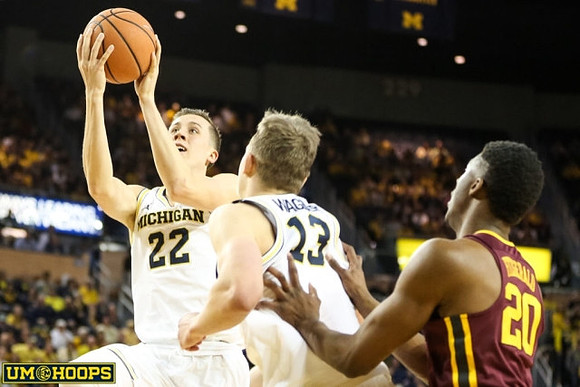 Duncan Robinson (22) and Moritz Wagner (13)