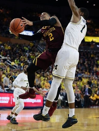 Charles Matthews (1) and Zavier Simpson (3)