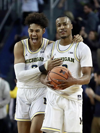 Jordan Poole (2) and Muhammad-Ali Abdur-Rahkman (12)