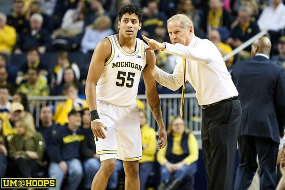 Eli Brooks (55) and John Beilein