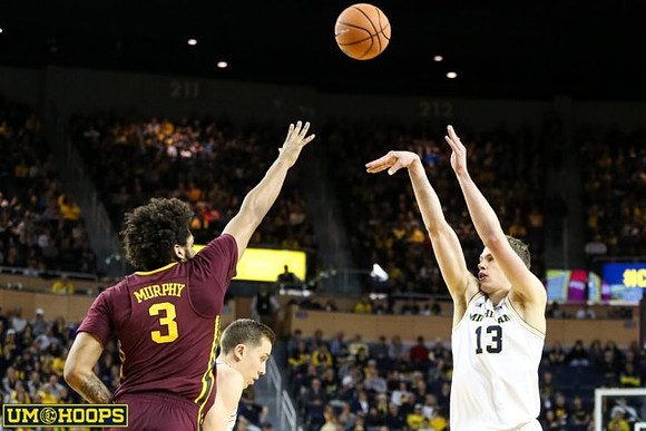 Moritz Wagner (13) and Duncan Robinson (22)