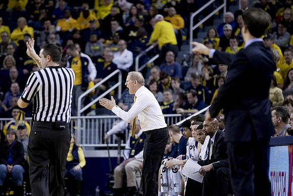 John Beilein and Minnesota Head Coach Richard Pitino