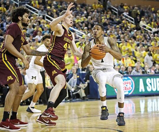 Isaiah Livers (4) and Charles Matthews (1)
