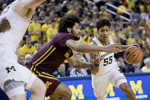 Jon Teske (15) and Eli Brooks (55)