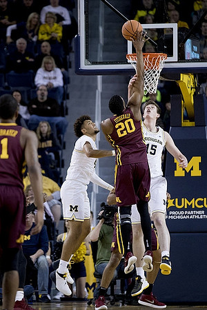 Isaiah Livers (4) and Jon Teske (15)