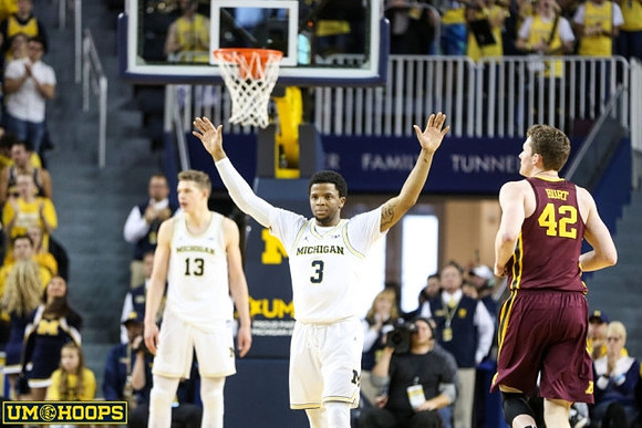 Moritz Wagner (13) and Zavier Simpson (3)