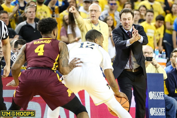 Muhammad-Ali Abdur-Rahkman (12) and Minnesota Head Coach Richard Pitino